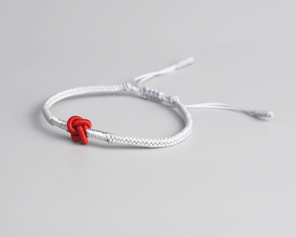 Bracelet Bouddhiste porte-chance noué à la main