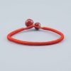bracelet rouge bouddhiste